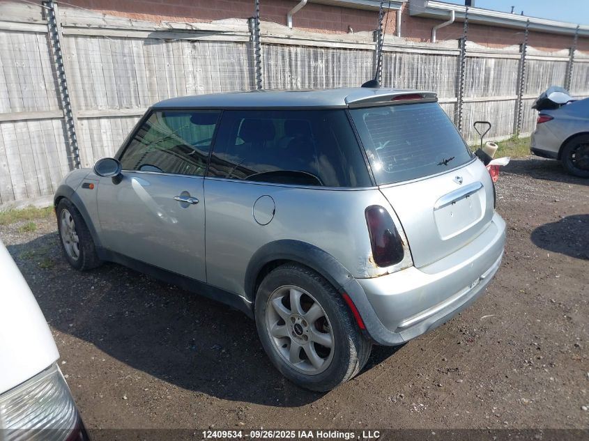 2006 Mini Cooper VIN: WMWRC33586TK18036 Lot: 12409534