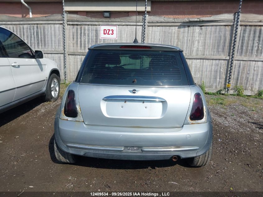 2006 Mini Cooper VIN: WMWRC33586TK18036 Lot: 12409534