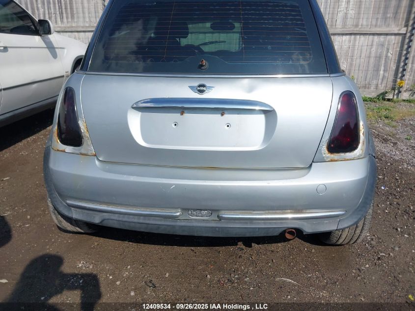 2006 Mini Cooper VIN: WMWRC33586TK18036 Lot: 12409534