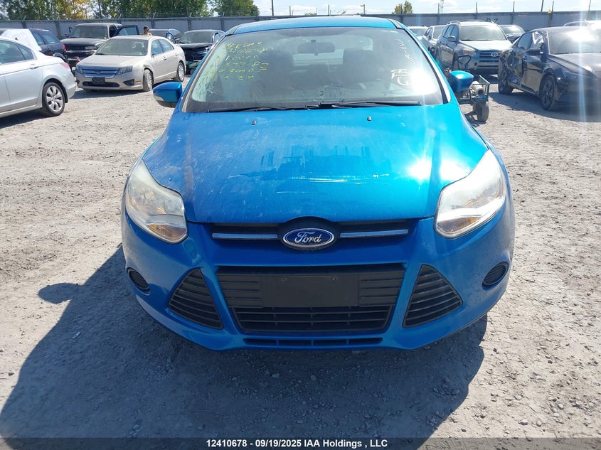 2014 Ford Focus Se VIN: 1FADP3F23EL377182 Lot: 12410678