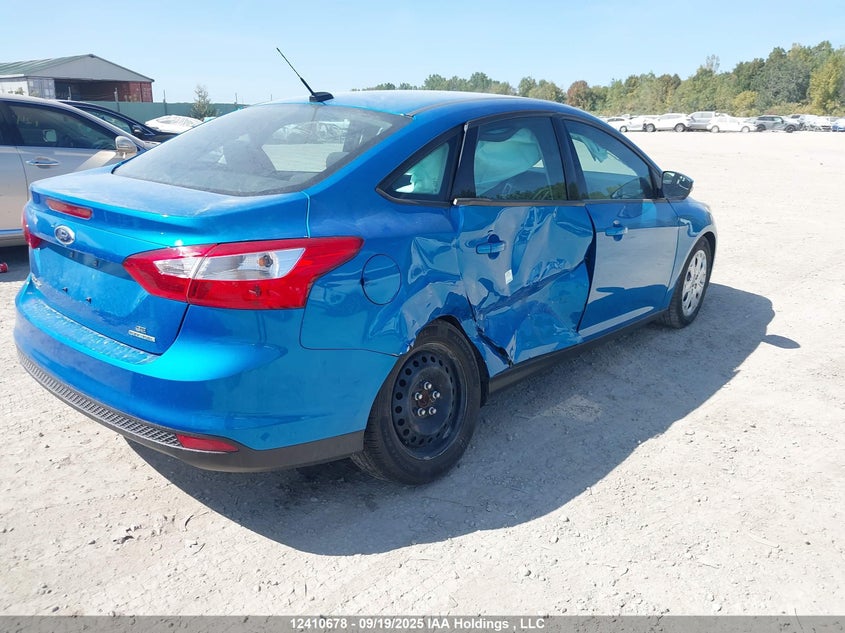 2014 Ford Focus Se VIN: 1FADP3F23EL377182 Lot: 12410678