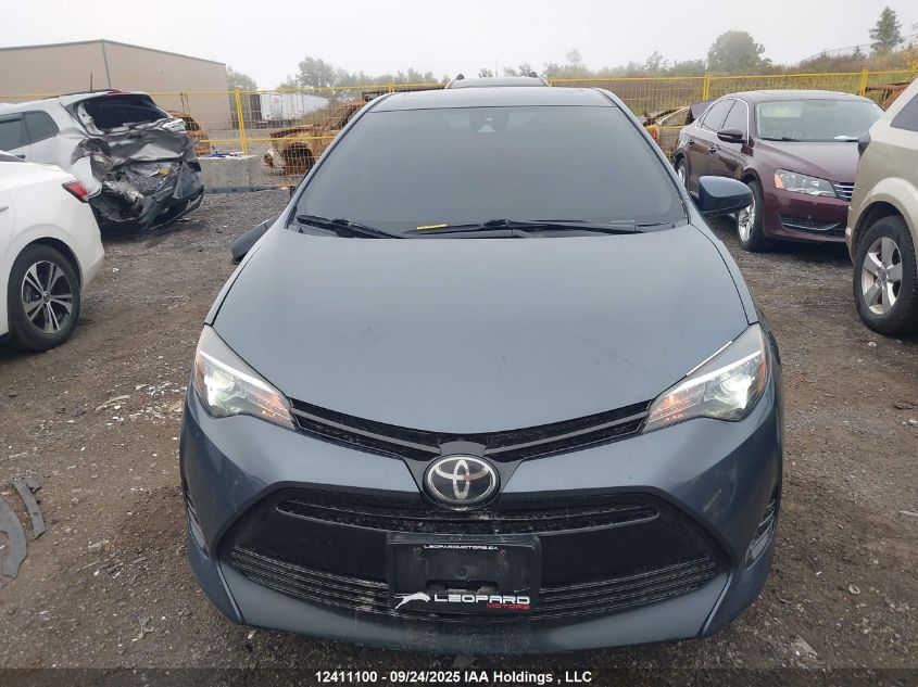 2018 Toyota Corolla Le VIN: 2T1BURHEXJC085048 Lot: 12411100