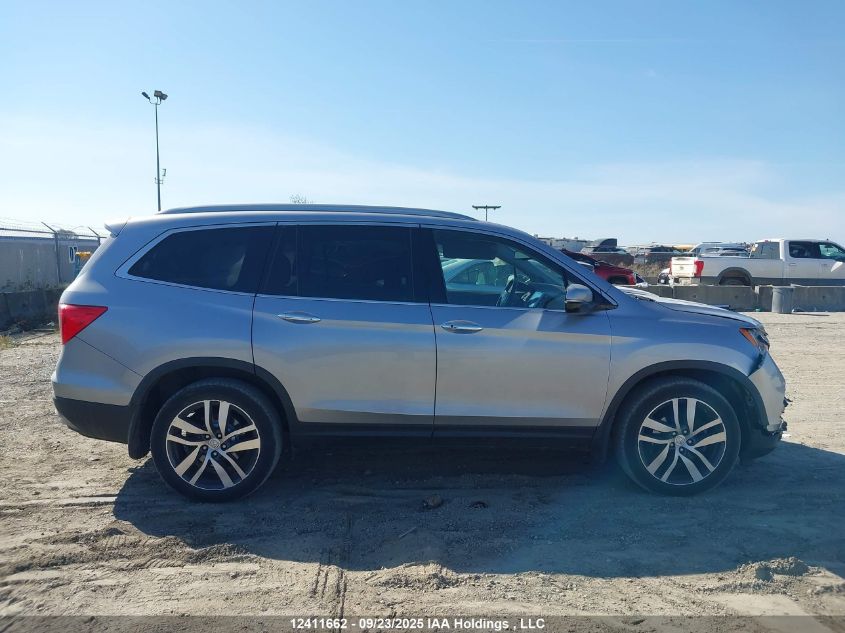 2018 Honda Pilot Touring VIN: 5FNYF6H98JB502040 Lot: 12411662