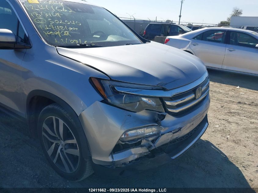 2018 Honda Pilot Touring VIN: 5FNYF6H98JB502040 Lot: 12411662