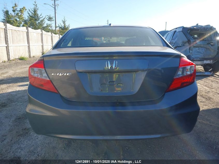 2012 Honda Civic Exl VIN: 2HGFB2F9XCH057068 Lot: 12412691