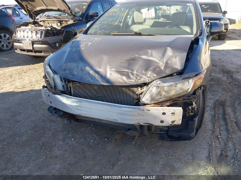 2012 Honda Civic Exl VIN: 2HGFB2F9XCH057068 Lot: 12412691