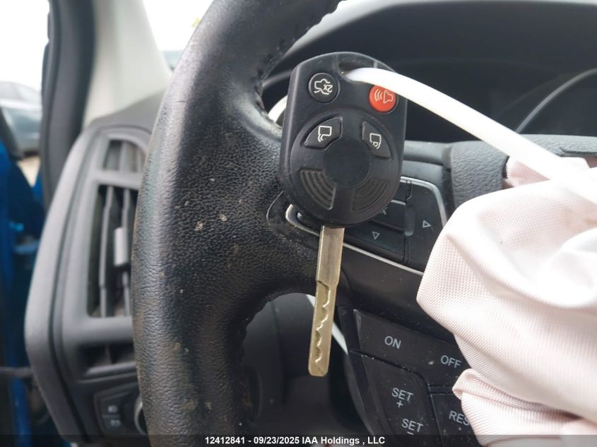 2015 Ford Focus Se VIN: 1FADP3F22FL302992 Lot: 12412841