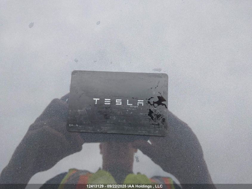 2024 Tesla Model Y VIN: 7SAYGDEE3RF124744 Lot: 12413129