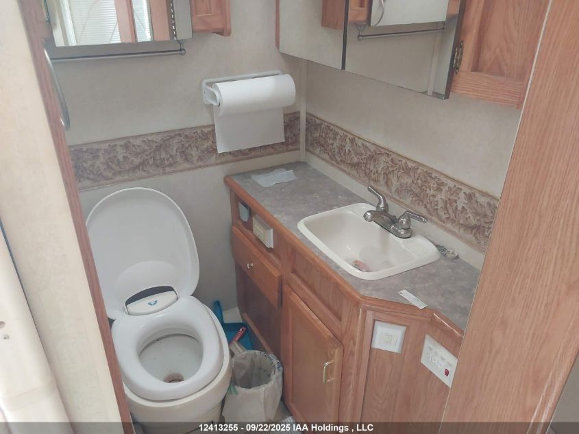 2003 Ford Econoline E450 Super Duty Cutwy Van VIN: 1FDXE45S33HA86312 Lot: 12413255