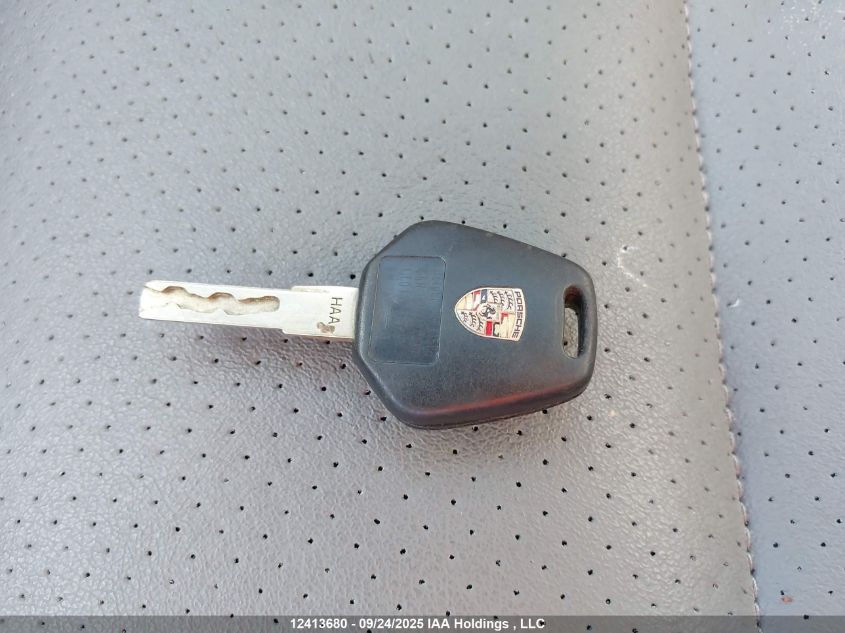 1999 Porsche Boxster VIN: WP0CA298XXU623319 Lot: 12413680