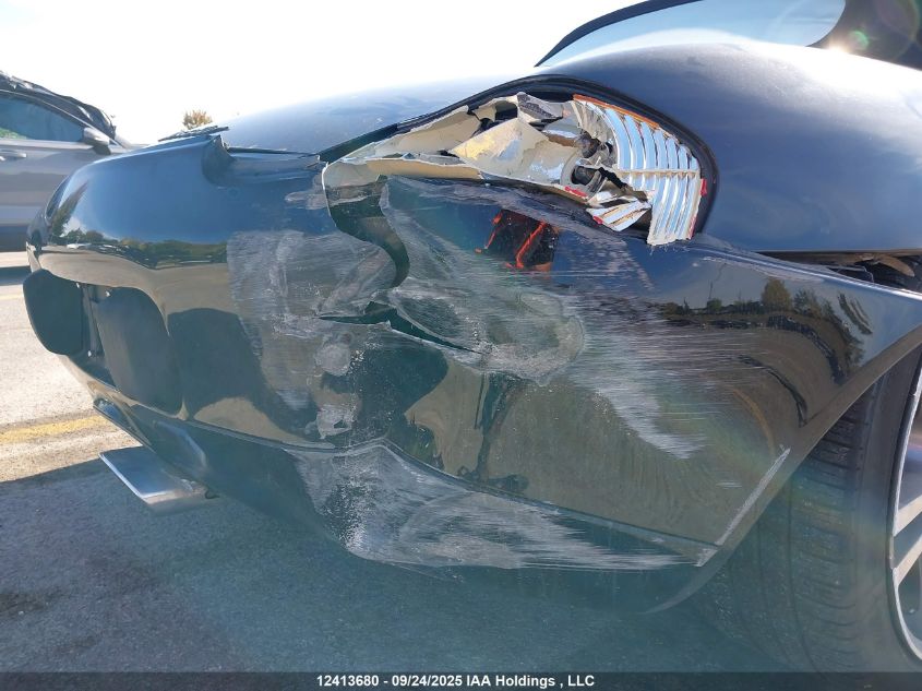 1999 Porsche Boxster VIN: WP0CA298XXU623319 Lot: 12413680