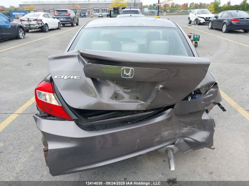 2012 Honda Civic Lx VIN: 2HGFB2F42CH023615 Lot: 12414030