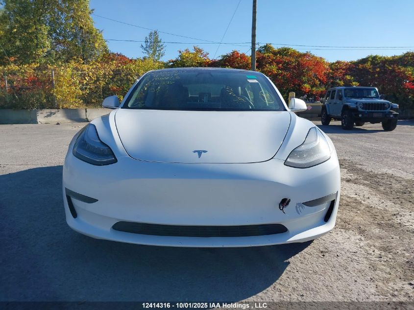 2019 Tesla Model 3 VIN: 5YJ3E1EB3KF390398 Lot: 12414316