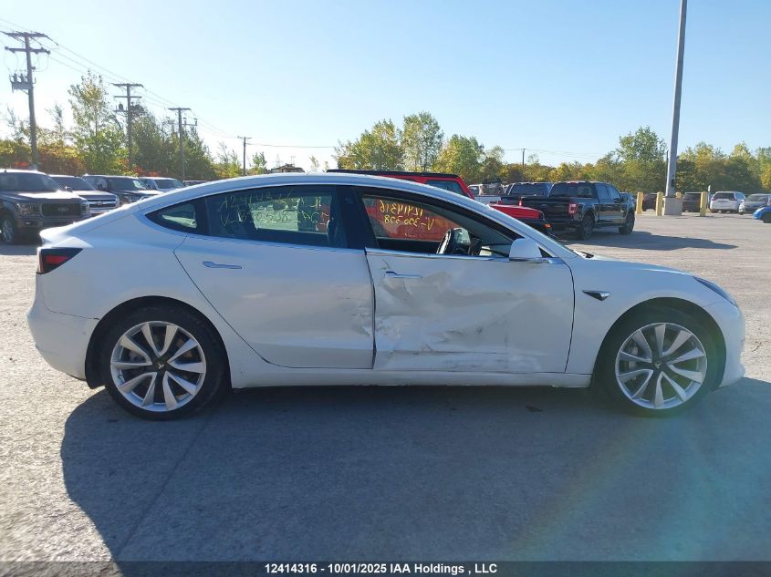 2019 Tesla Model 3 VIN: 5YJ3E1EB3KF390398 Lot: 12414316