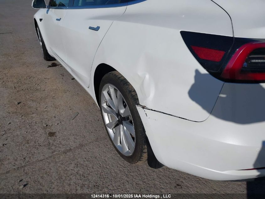 2019 Tesla Model 3 VIN: 5YJ3E1EB3KF390398 Lot: 12414316