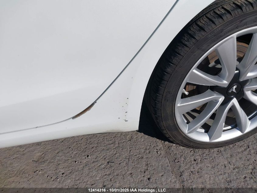 2019 Tesla Model 3 VIN: 5YJ3E1EB3KF390398 Lot: 12414316