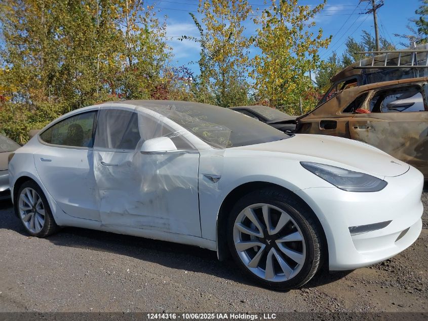 2019 Tesla Model 3 VIN: 5YJ3E1EB3KF390398 Lot: 12414316