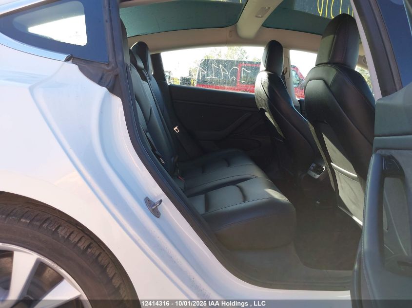 2019 Tesla Model 3 VIN: 5YJ3E1EB3KF390398 Lot: 12414316