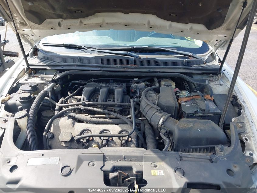 2012 Ford Taurus VIN: 1FAHP2EW6CG102332 Lot: 12414627