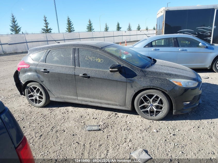 2015 Ford Focus Se VIN: 1FADP3K2XFL331808 Lot: 12415490