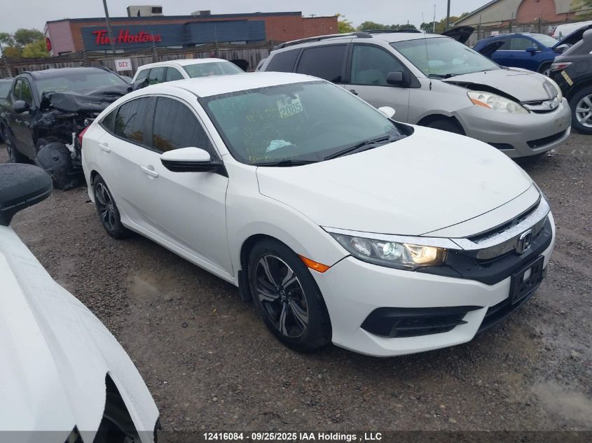 2018 Honda Civic Lx VIN: 2HGFC2F52JH026095 Lot: 12416084