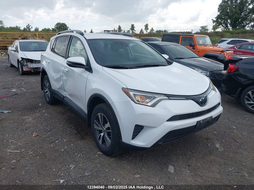 2T3ZFREV1JW422600 2018 Toyota Rav4 Le auction photo 1
