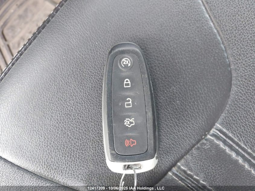 2013 Ford Focus Titanium VIN: 1FADP3J27DL303902 Lot: 12417209