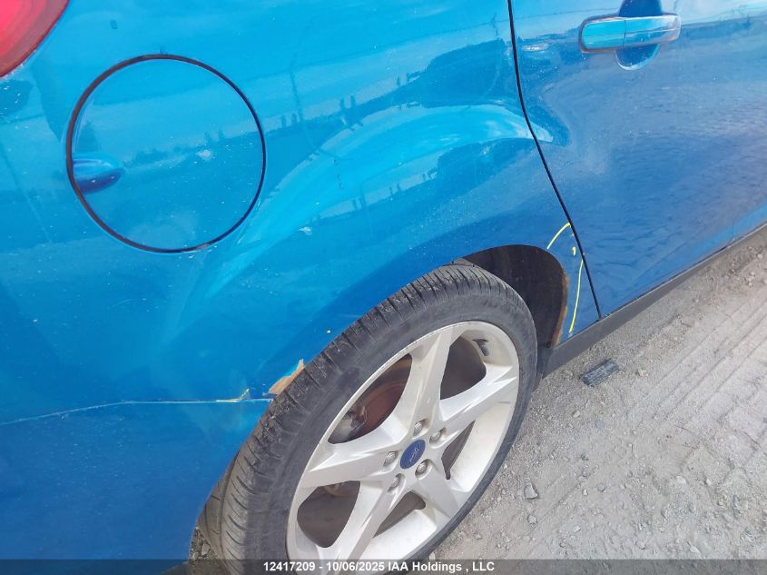 2013 Ford Focus Titanium VIN: 1FADP3J27DL303902 Lot: 12417209