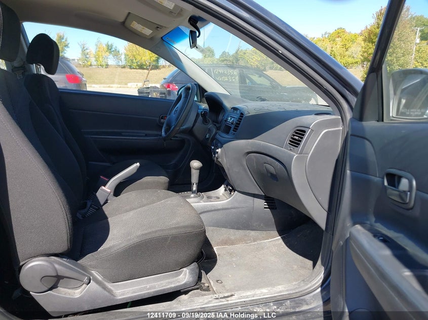 2009 Hyundai Accent Gl/Gl Sport/L VIN: KMHCN35C29U147473 Lot: 12411709X