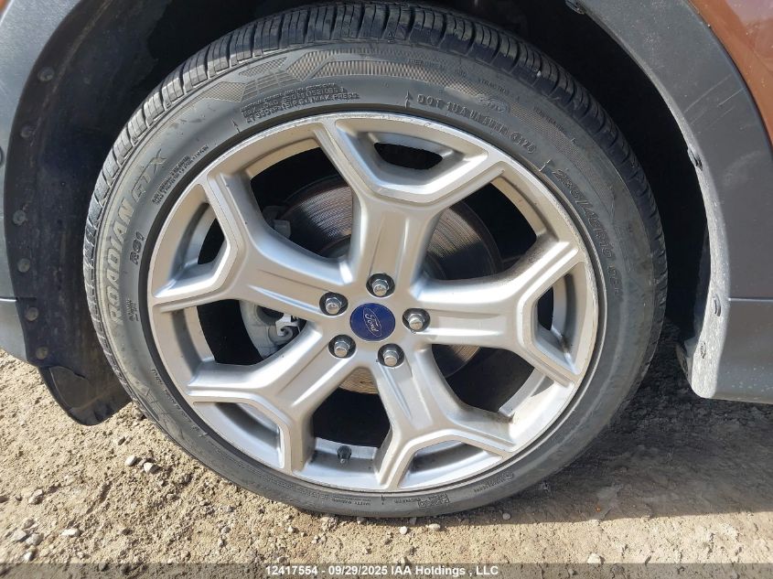 2017 Ford Escape Titanium VIN: 1FMCU9J9XHUD98109 Lot: 12417554