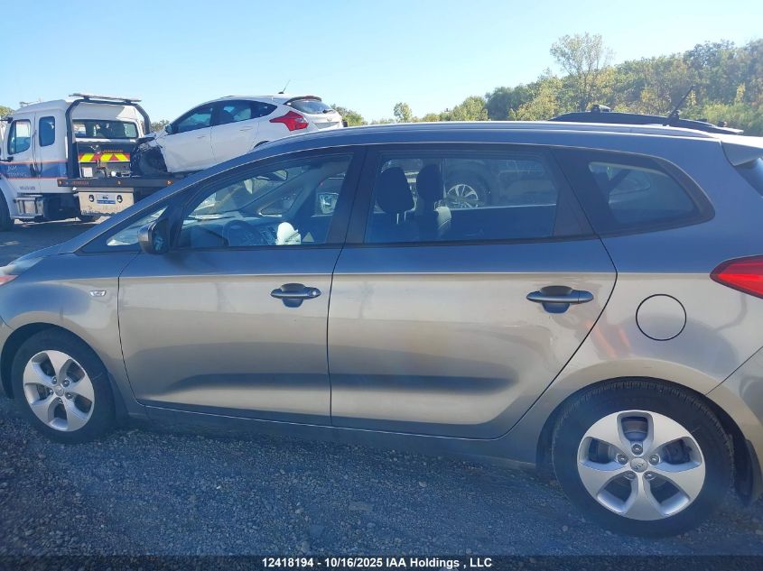 2014 Kia Rondo VIN: KNAHT8A35E7028499 Lot: 12418194