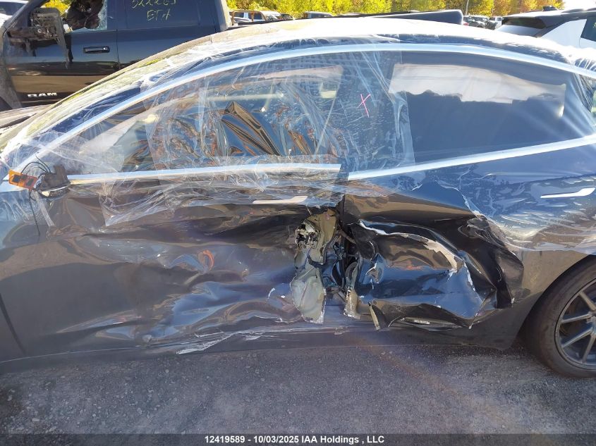 2019 Tesla Model 3 VIN: 5YJ3E1EA0KF321613 Lot: 12419589