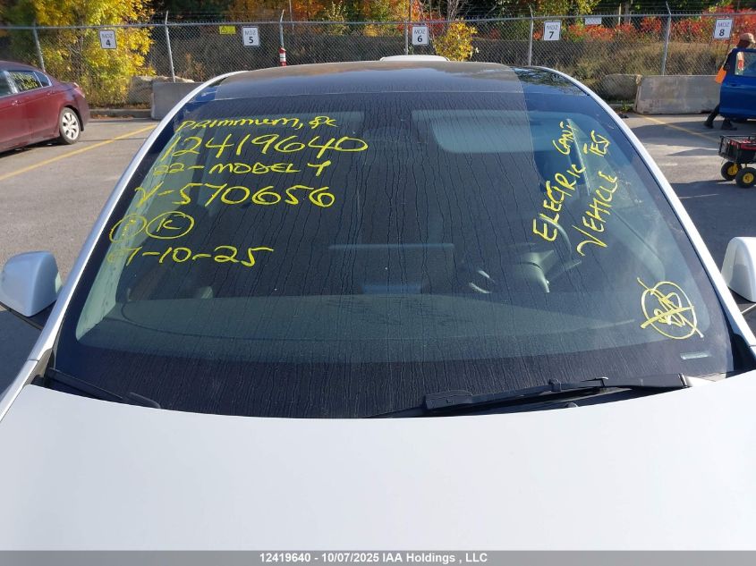 2022 Tesla Model Y Long Range VIN: 7SAYGAEEXNF570656 Lot: 12419640