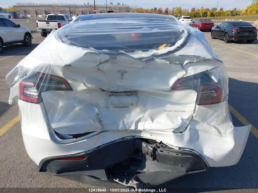 2022 Tesla Model Y Long Range VIN: 7SAYGAEEXNF570656 Lot: 12419640