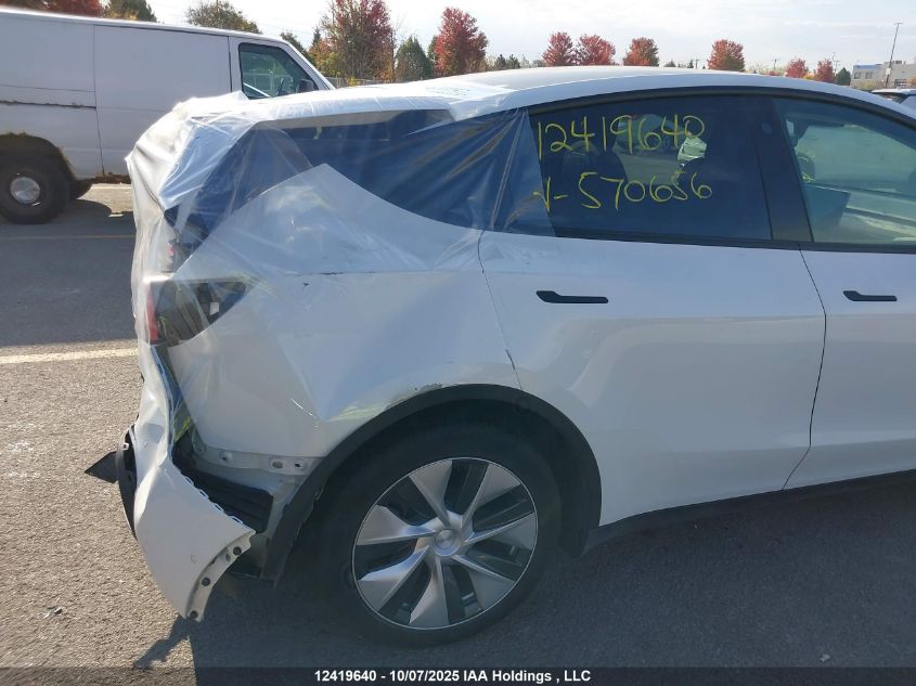 2022 Tesla Model Y Long Range VIN: 7SAYGAEEXNF570656 Lot: 12419640