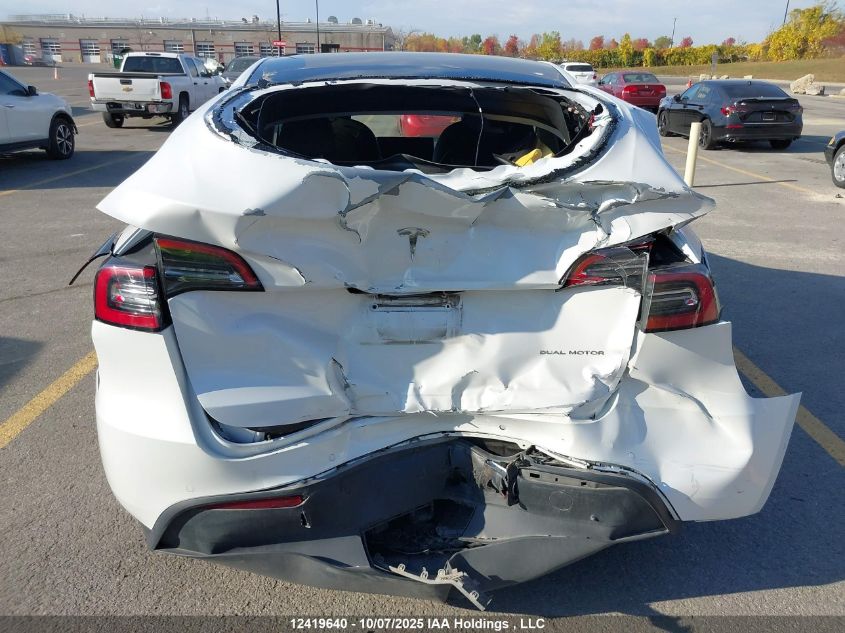 2022 Tesla Model Y Long Range VIN: 7SAYGAEEXNF570656 Lot: 12419640