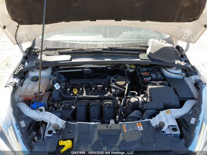 2016 Ford Focus Titanium VIN: 1FADP3N21GL206273 Lot: 12421805