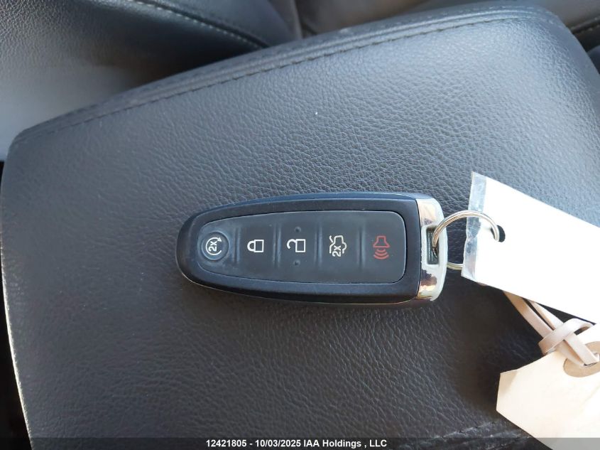 2016 Ford Focus Titanium VIN: 1FADP3N21GL206273 Lot: 12421805