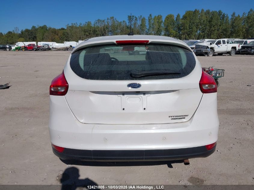 2016 Ford Focus Titanium VIN: 1FADP3N21GL206273 Lot: 12421805