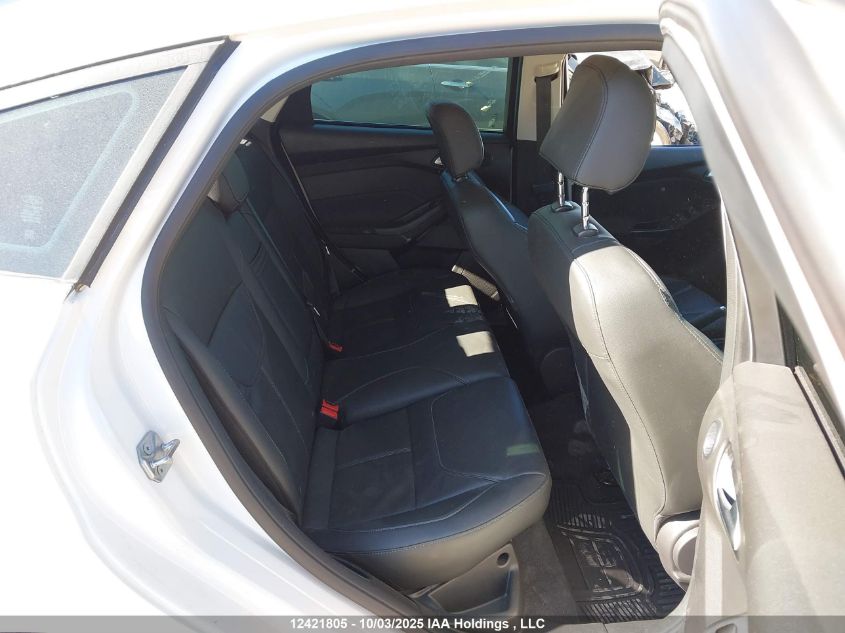 2016 Ford Focus Titanium VIN: 1FADP3N21GL206273 Lot: 12421805