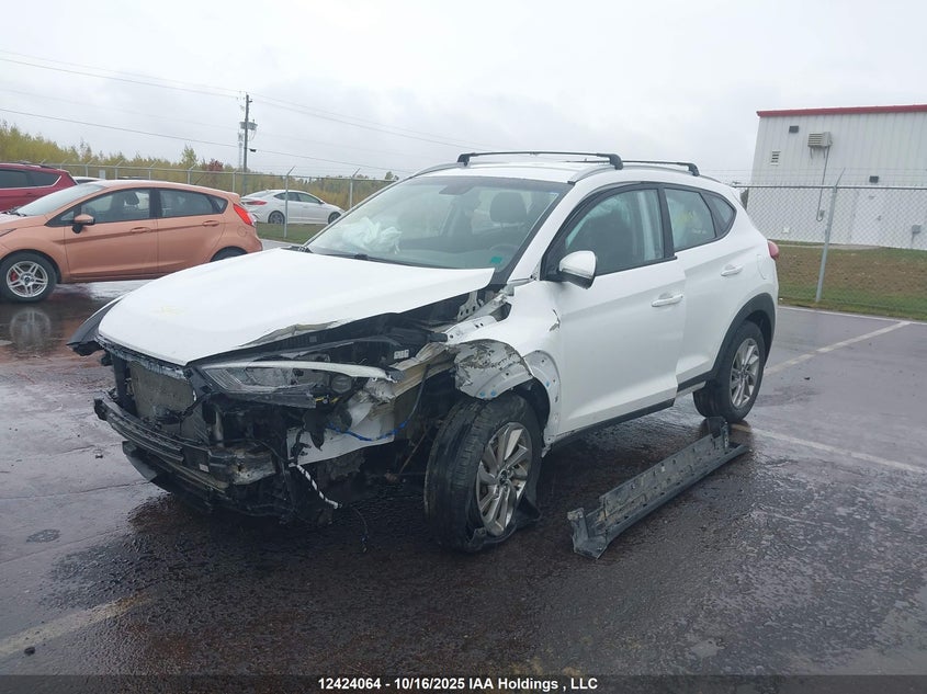 2018 Hyundai Tucson Premium 2.0L VIN: KM8J33A46JU727759 Lot: 12424064