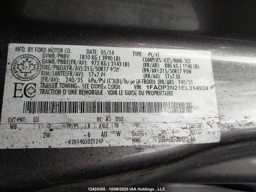 2014 Ford Focus Titanium VIN: 1FADP3N21EL314924 Lot: 12424355