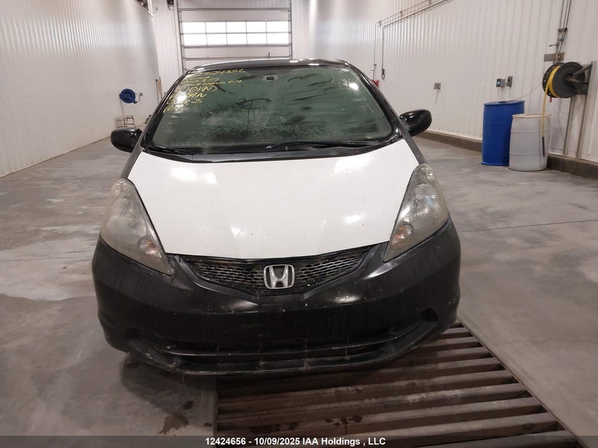 2009 Honda Fit Lx VIN: JHMGE87519S802119 Lot: 12424656