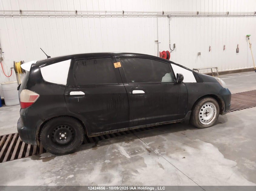 2009 Honda Fit Lx VIN: JHMGE87519S802119 Lot: 12424656