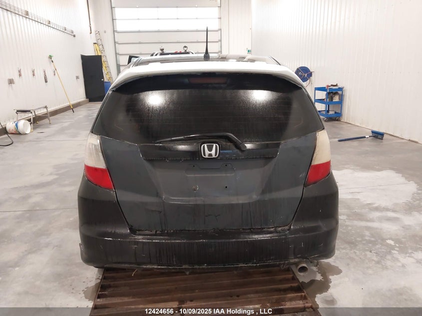 2009 Honda Fit Lx VIN: JHMGE87519S802119 Lot: 12424656