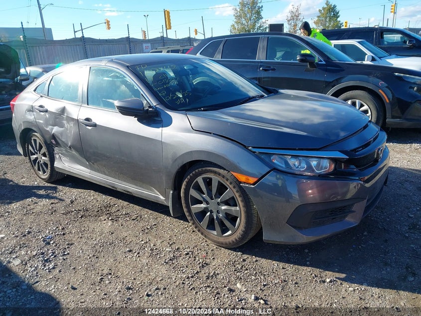 2017 Honda Civic Lx grey sedan null 2HGFC2F54HH018297 photo #1