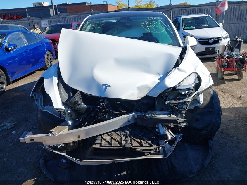 2023 Tesla Model Y Long Range VIN: LRWYGDEEXPC029084 Lot: 12425518