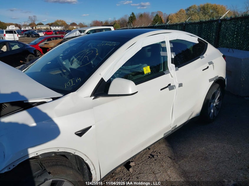 2023 Tesla Model Y Long Range VIN: LRWYGDEEXPC029084 Lot: 12425518