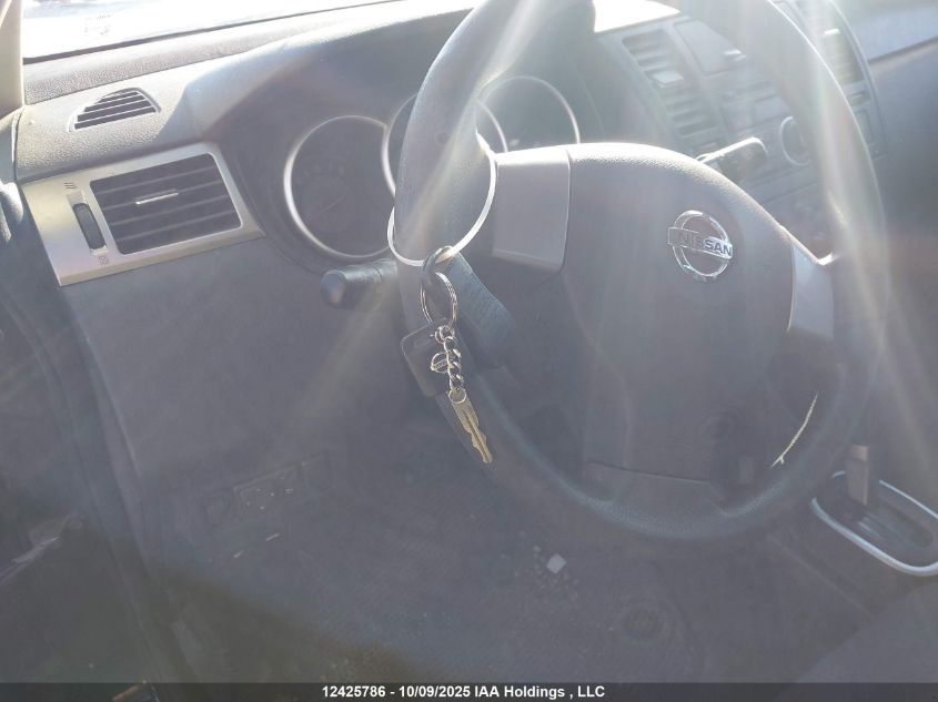 2009 Nissan Versa 1.8S VIN: 3N1BC13EX9L446141 Lot: 12425786