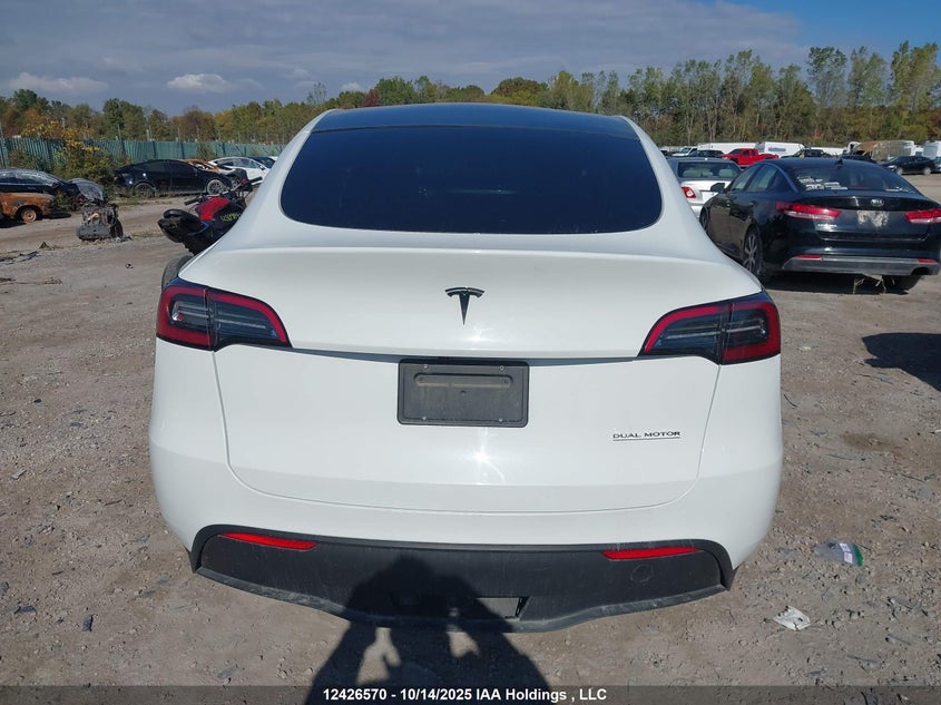 2023 Tesla Model Y VIN: 7SAYGDEE0PF772605 Lot: 12426570